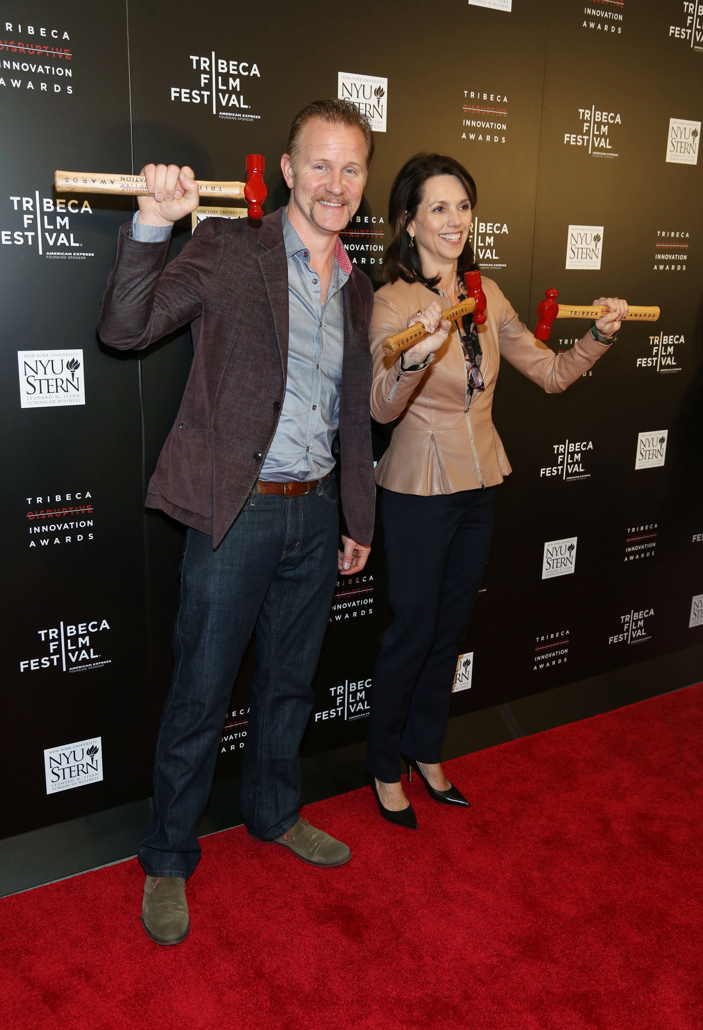 Morgan Spurlock and Beth Comstock attend Tribeca Disruptive Innovation Awards on April 26, 2013 in New York City.