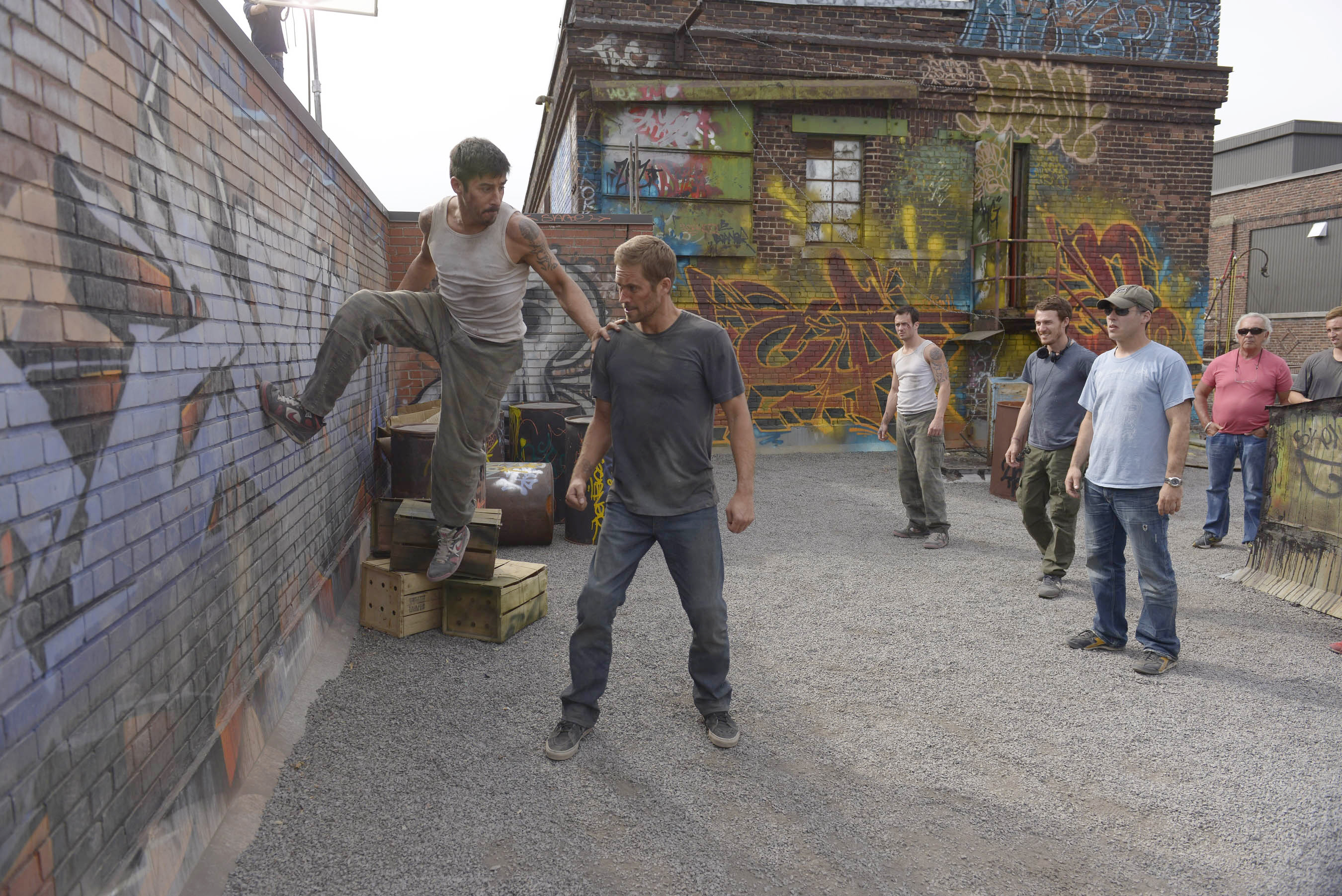 Still of Camille Delamarre, Paul Walker and David Belle in 13 rajonas: plytu rumai (2014)