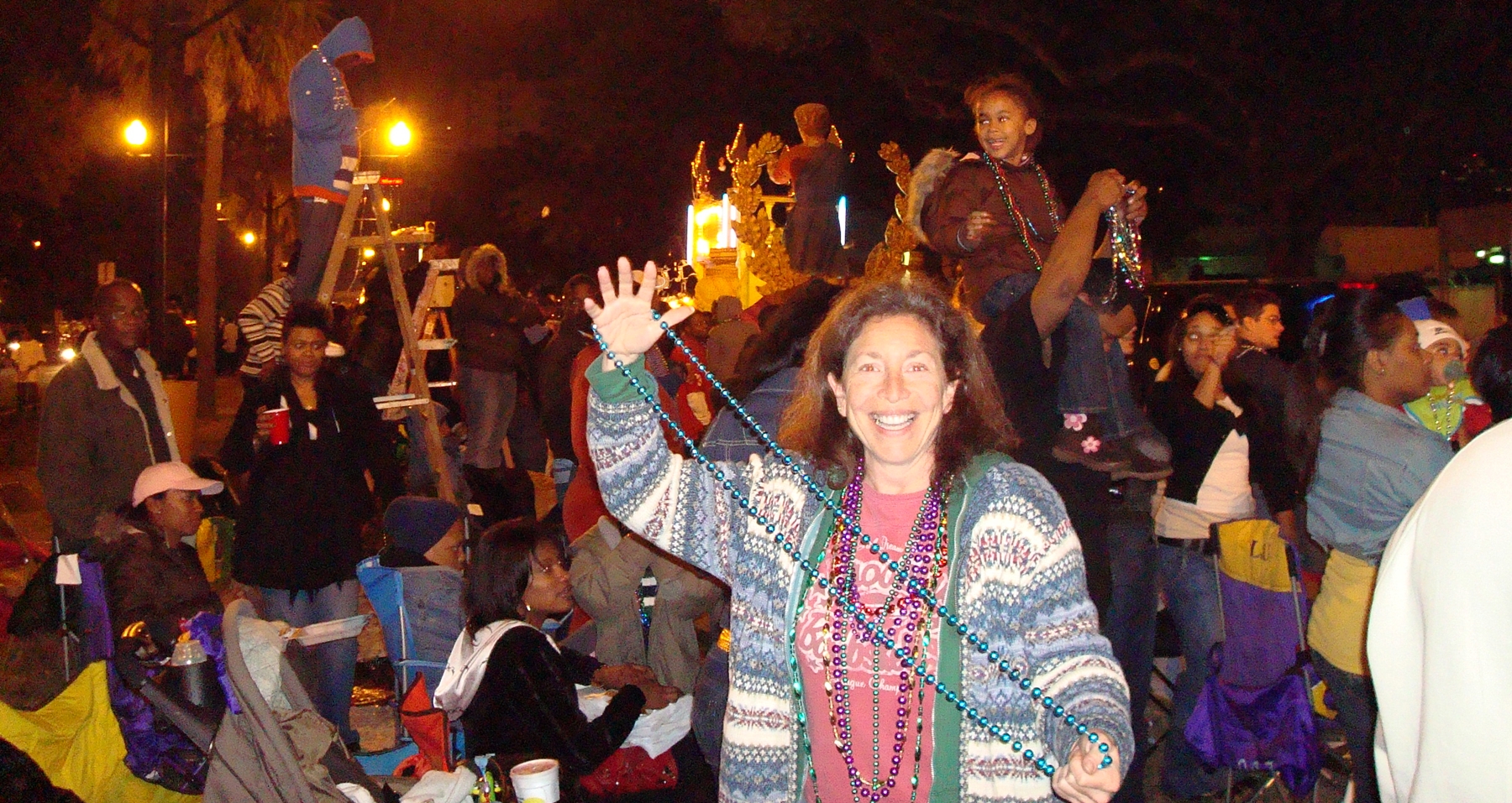 Totally psyched about catching beads from the Doobie Brothers float on Canal Street. Endymion Parade, Mardi Gras 2008