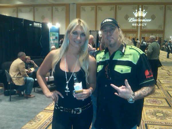 Rich Hopkins hanging out with Brooke Hogan at an Industry Trade Show