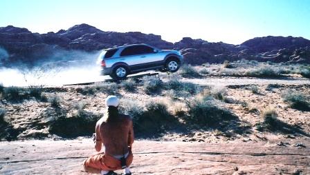 Stunt Coordinator, Rich Hopkins (foreground) on location: Valley of Fire, Nevada.. Spot for 