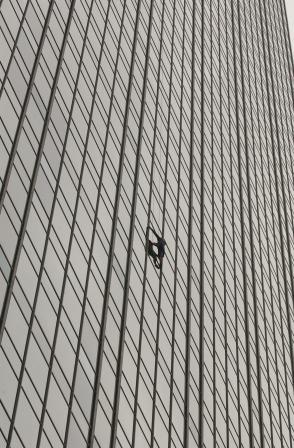 Stunt Coordinator/Stuntman Rich Hopkins on the side of the 1000' Renaissance Tower in Dallas Texas for the Spiderman Premier, Halloween 2003