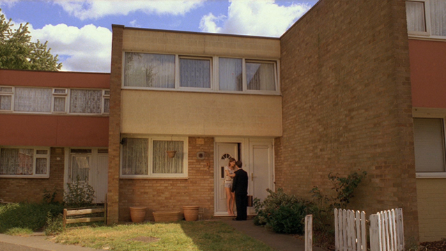 Still of Helen Mutch and Andy Bates in Gardens with Red roses