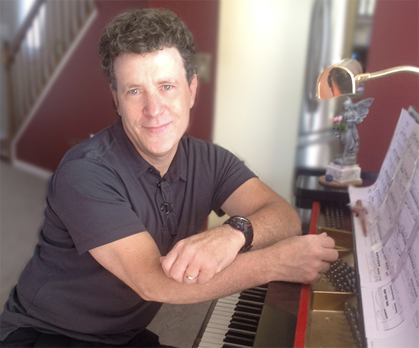 Mike Kroell at his piano in his Chicago home