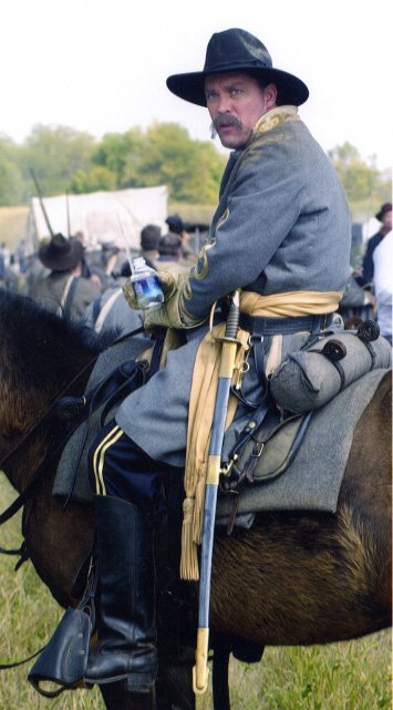 Actor Fred Griffith as General Robert Emmett Rodes cools down between takes