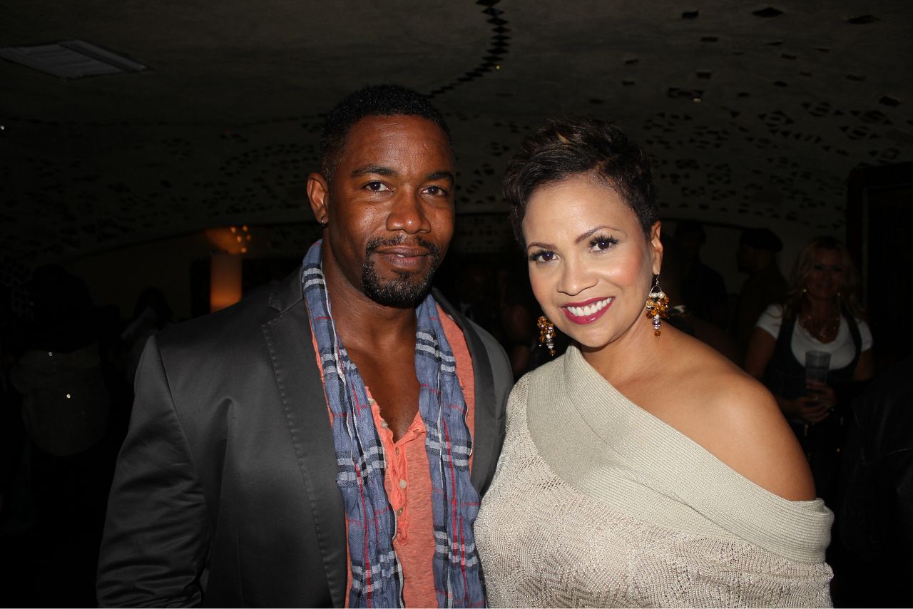 A Tribute to The Whispers standing with Michael Jai White