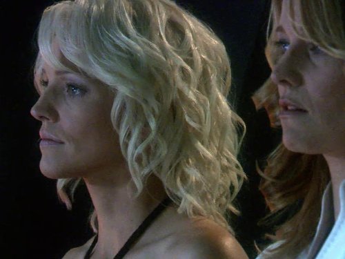 Still of Lucy Lawless and Tricia Helfer in Battlestar Galactica (2004)
