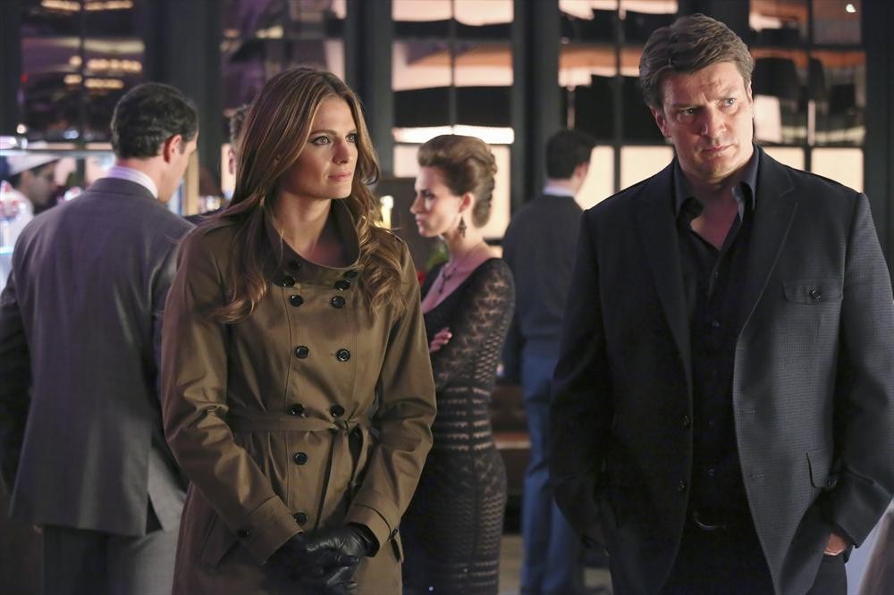 Still of Nathan Fillion and Stana Katic in Kastlas (2009)