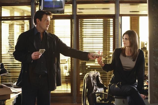 Still of Nathan Fillion and Stana Katic in Kastlas (2009)