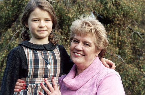 Young actress SOPHIE VAVASSEUR (left) poses with the real-life EVELYN DOYLE, whose childhood served as the inspiration for the film.