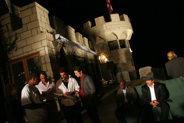 Director Eric Etebari confers with actors Anthony Cistaro (Donald Loften), Race Owen (Fight Manager), Sabastian Scott (Ringman)