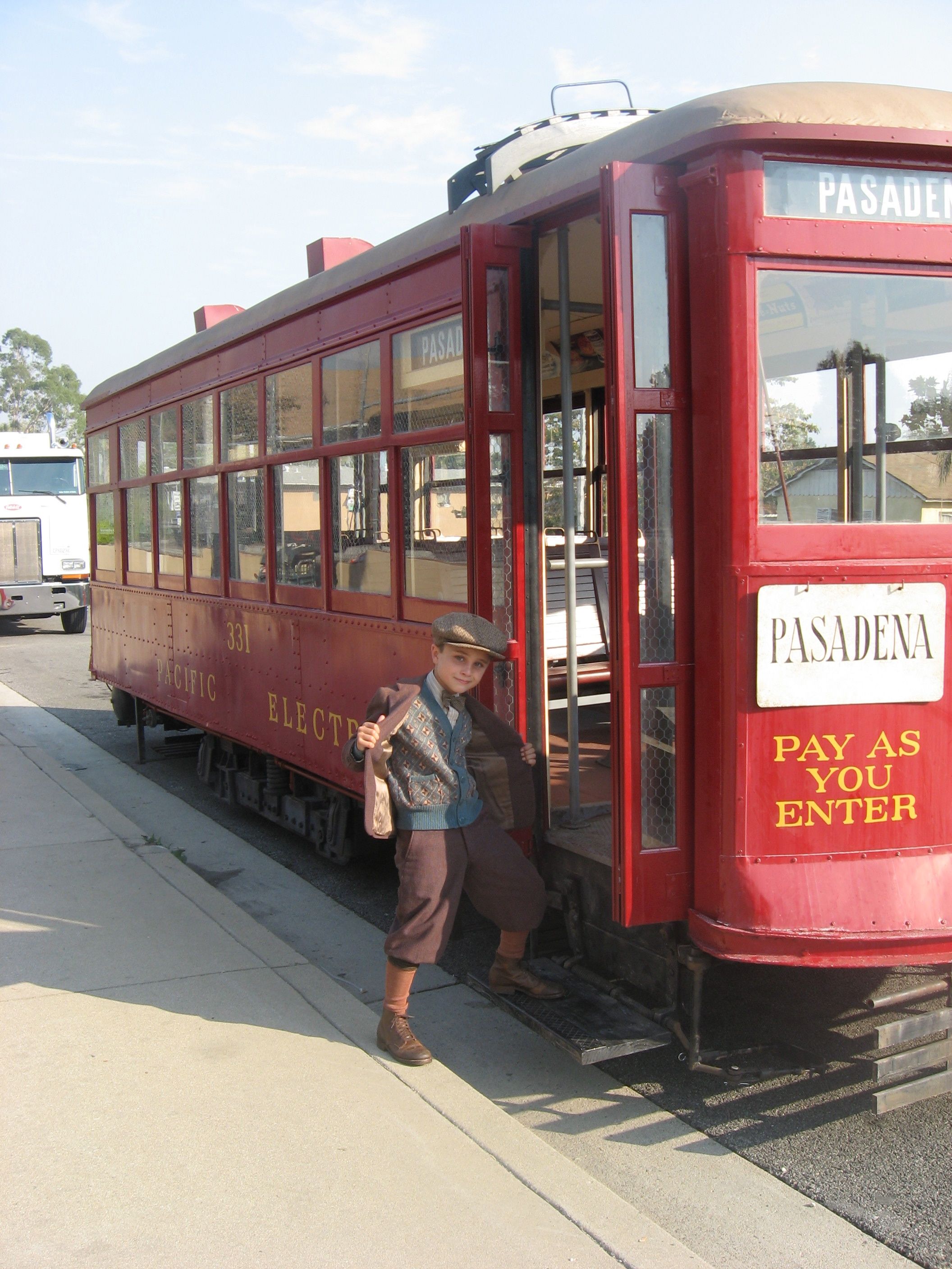 Gattlin on trolley car on the set of The Changeling.