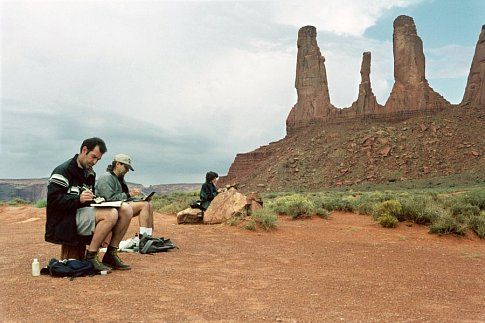 On a whirlwind four-day research trip to some of America's most scenic locations, production designer KATHY ALTIERI (far right) and art directors LUC DESMARCHELIER (left) and RON LUKAS take a moment to sketch the unique rock formations of Monument Valley