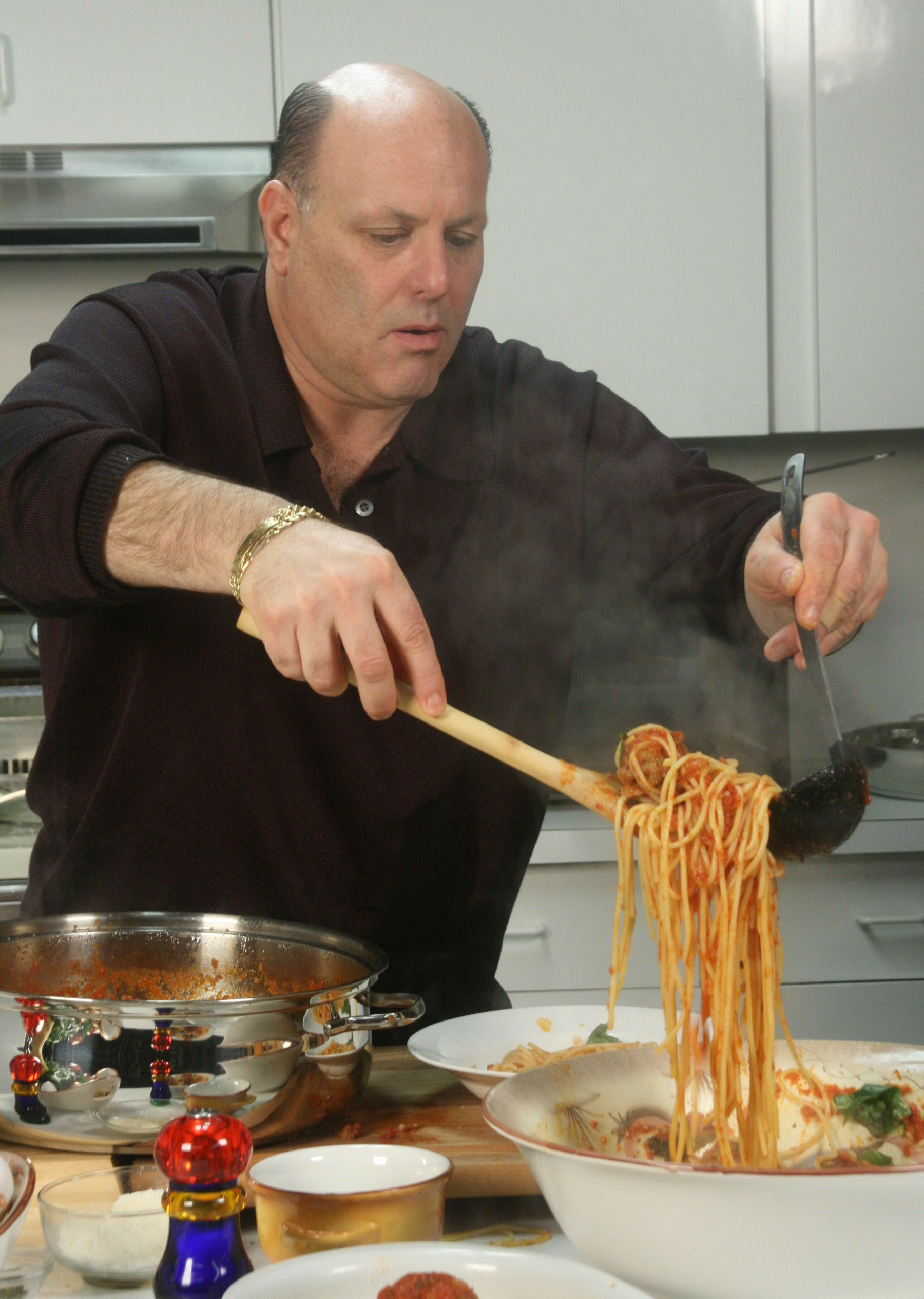 Frankie the Butcher in action cooking a Classic dish Spaghetti and Meatballs on his show Titled What's for Dinner with Frankie the Butcher on the www.italianamericannetwork.com under food and recipe's