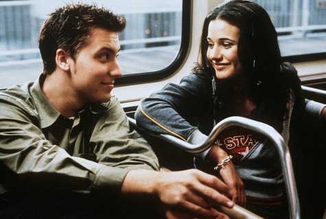 Still of Lance Bass and Emmanuelle Chriqui in On the Line (2001)