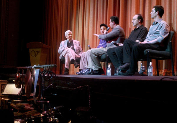 Jeffrey Vance, center, with film critic Roger Ebert, far left, Darren Ng, second from left, and Ken Winokur and Terry Donahue of The Alloy Orchestra, far right, during a panel discussion at the 6th Annual Ebertfest, April 23, 2004.