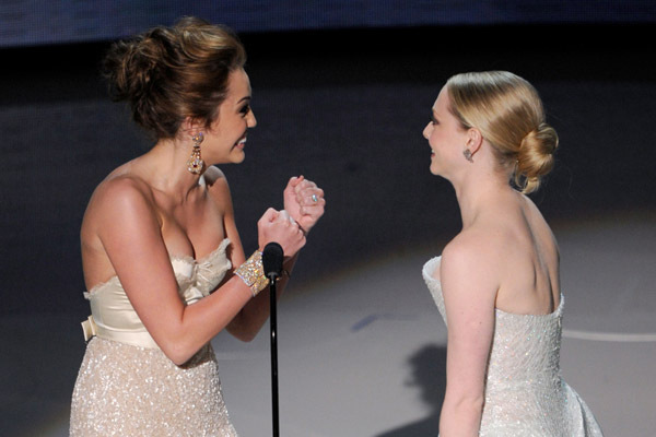 Amanda Seyfried and Miley Cyrus at event of The 82nd Annual Academy Awards (2010)