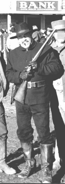 Joseph J. Dawson as the shotgun bank guard on an episode of 