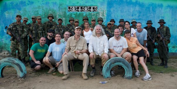 Jim (seated left) and Claudio Miranda (seated right) filming for Coke/Powerade FIFA World Cup in the jungle village of La Llanta, Colombia.