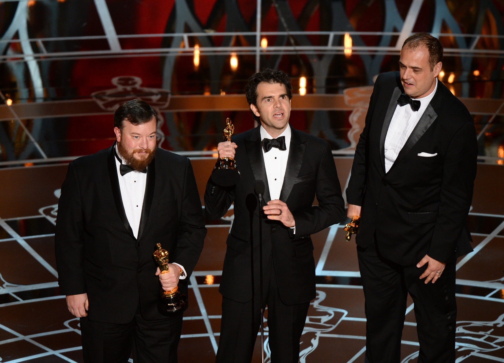 Ben Wilkins, Craig Mann and Thomas Curley at event of The Oscars (2015)