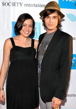 Ellen Thompson and Tyler Blackburn arrive at the Premiere of 