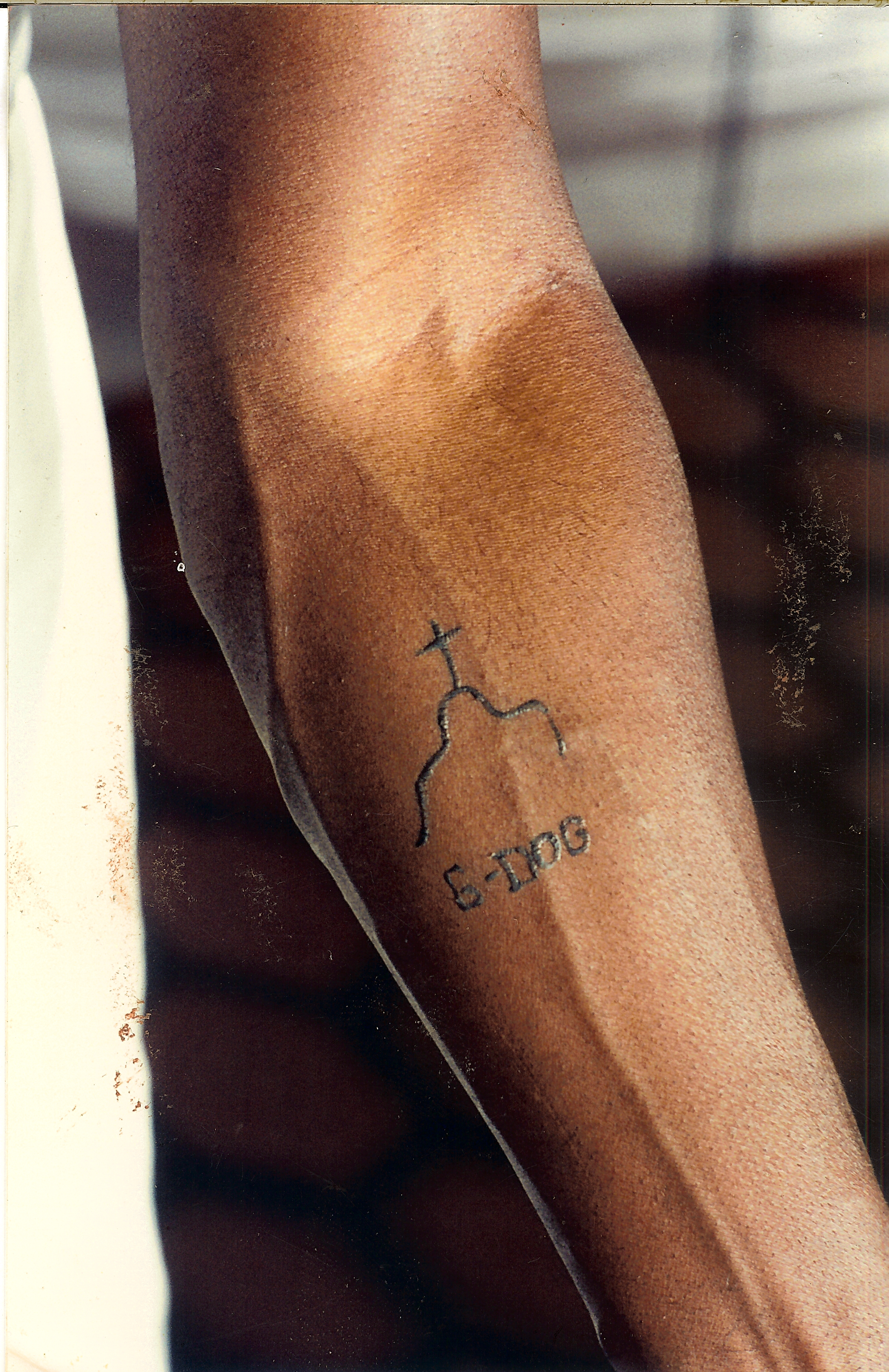 G-Dog tattoo on Dennis Haysbert as Breedan in 