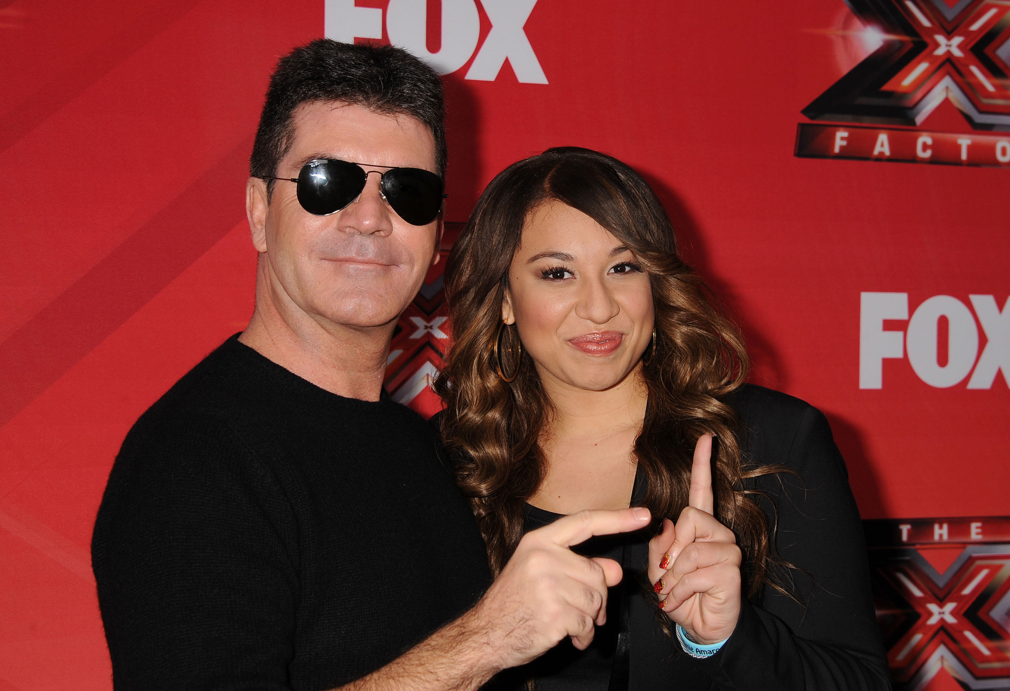 Simon Cowell and Melanie Amaro at event of The X Factor (2011)