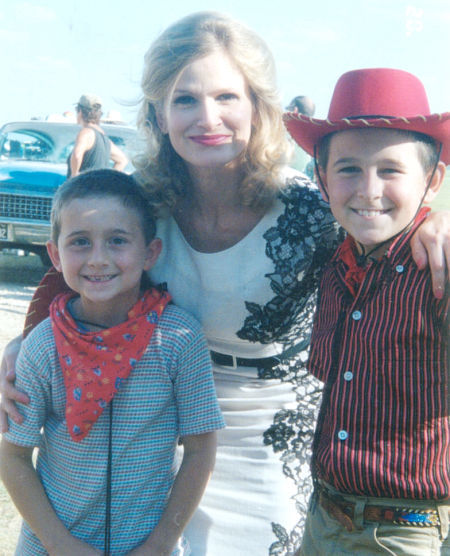 (l to r) Marc Musso, Kyra Sedgwick, and Mitchel Musso on the set of 