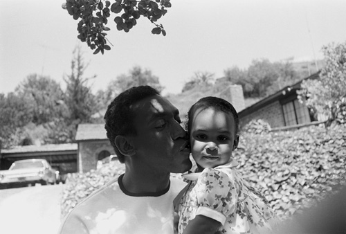 Bill Cosby at home with his daughter Erika