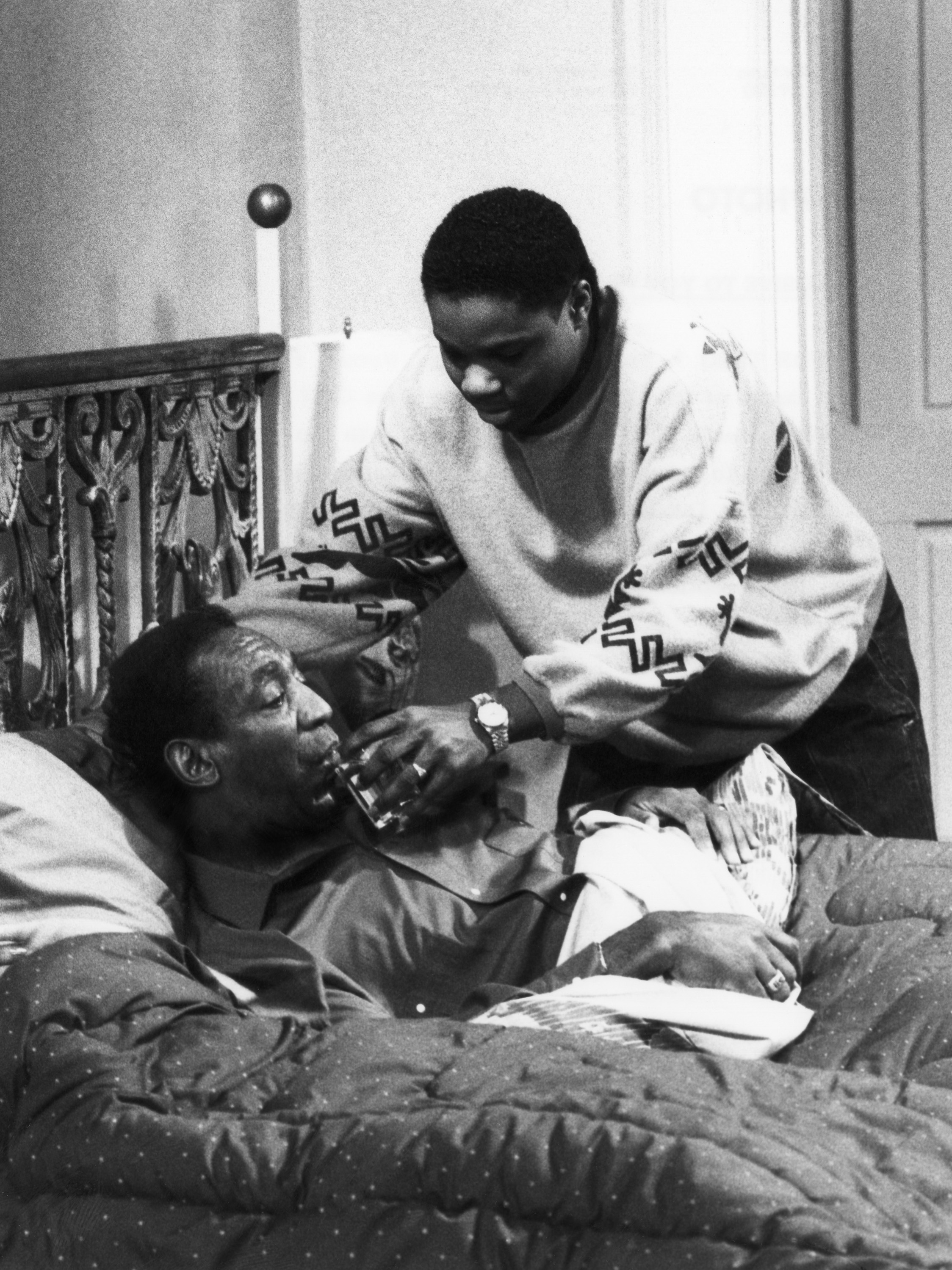 Still of Bill Cosby and Malcolm-Jamal Warner in The Cosby Show (1984)