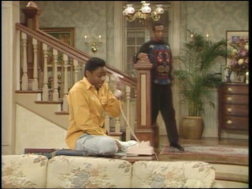 Still of Bill Cosby and Malcolm-Jamal Warner in The Cosby Show (1984)