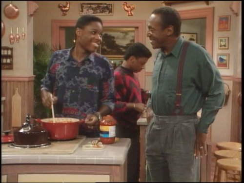 Still of Bill Cosby and Malcolm-Jamal Warner in The Cosby Show (1984)