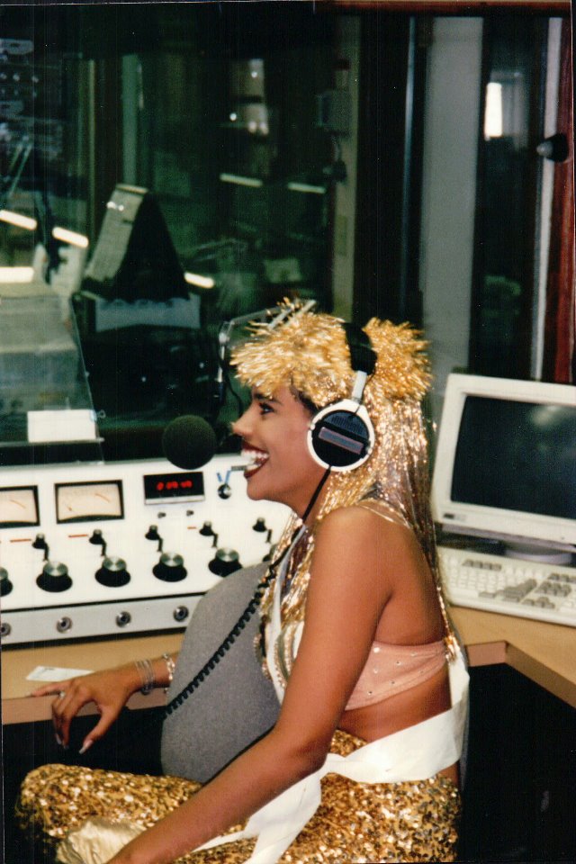 Nicci Freeman as Splash's Golden Mermaid doing a radio interview, 2006