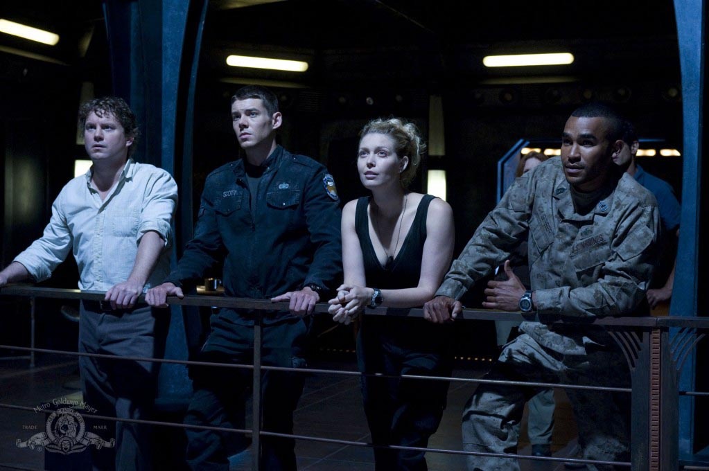 Still of Alaina Huffman, Jamil Walker Smith, Patrick Gilmore and Brian J. Smith in SGU Stargate Universe (2009)