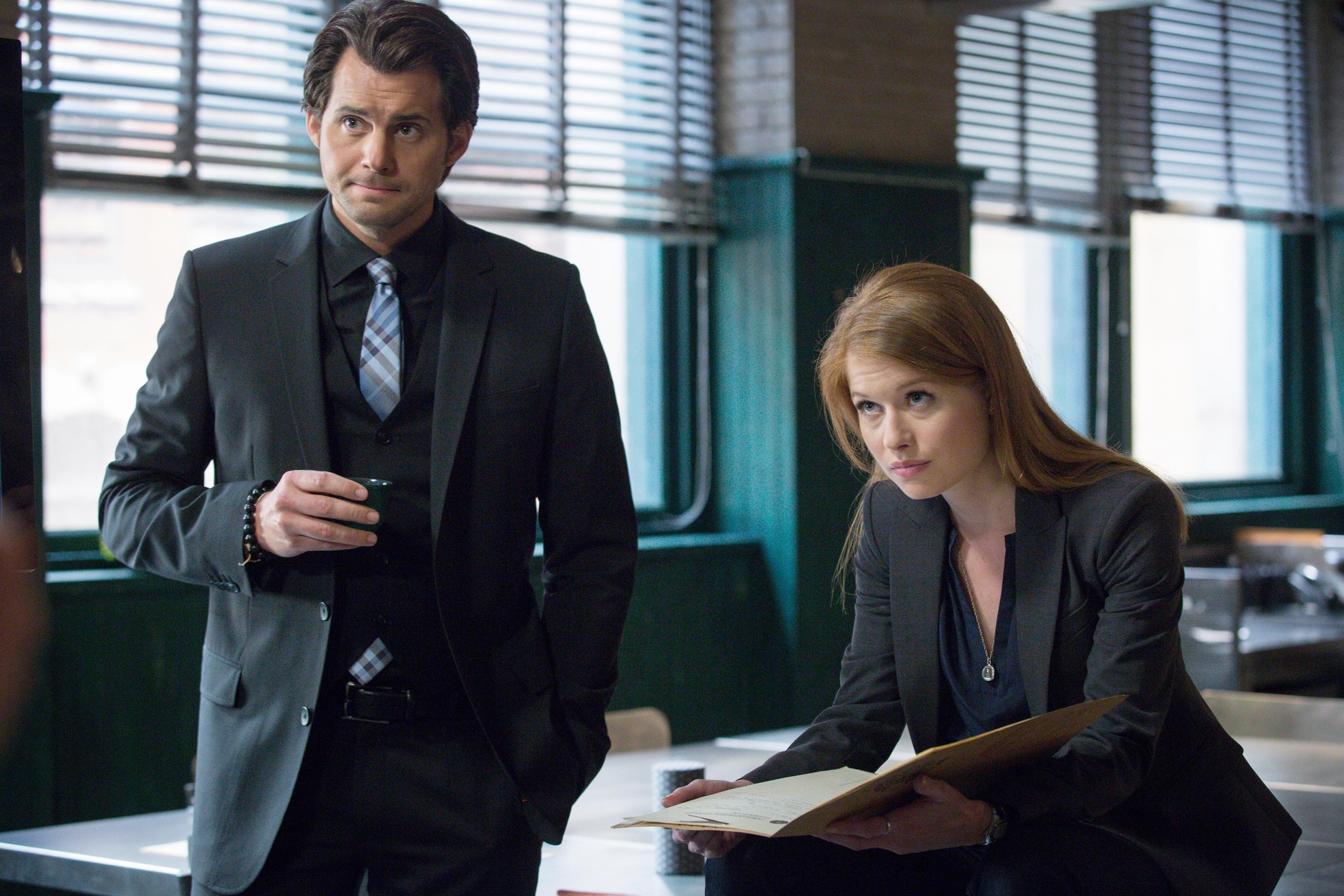 Still of Kristoffer Polaha and Genevieve Angelson in Backstrom (2015)