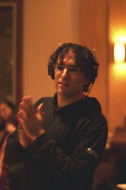 Michael Yezerski conducting the orchestra at 