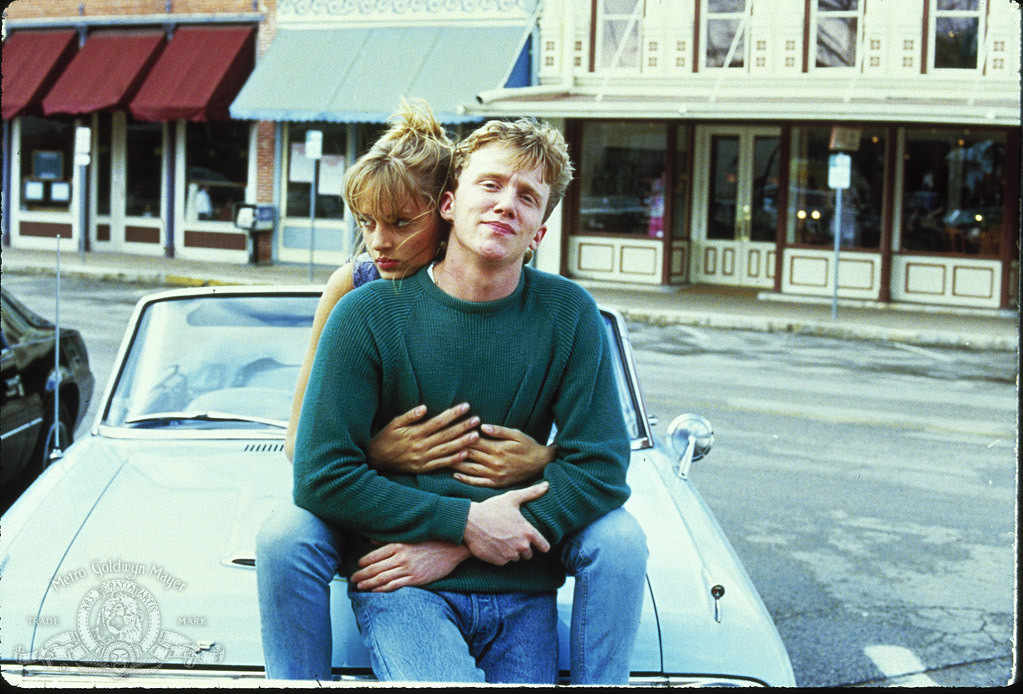 Still of Uma Thurman and Anthony Michael Hall in Johnny Be Good (1988)