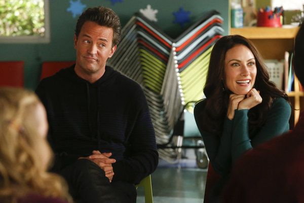 Still of Matthew Perry and Laura Benanti in Go On: The World Ain't Over 'Til It's Over (2012)