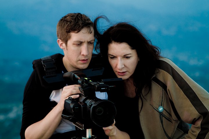 Matthew Akers with Marina Abramovic during the production of 