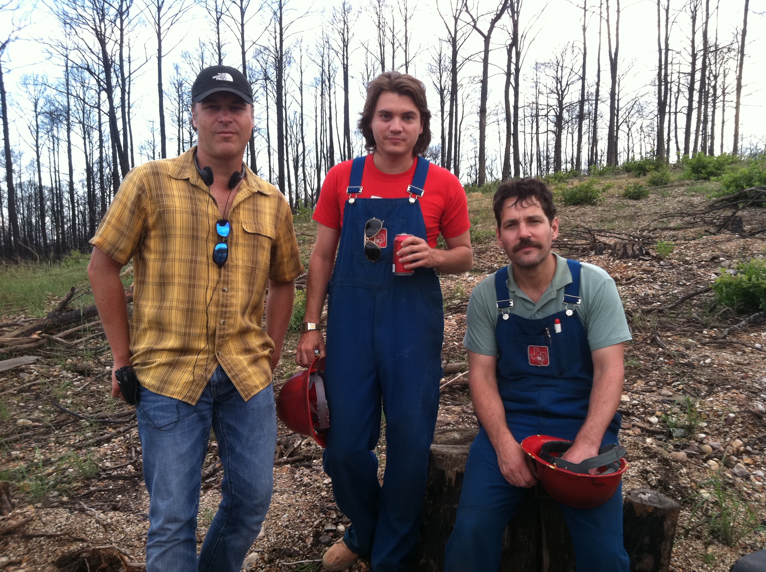 Producer Todd Labarowski, Actor Emile Hirsch, and Actor Paul Rudd on the set of 'Prince Avalanche' on May 11, 2012 in Bastrop, Texas.