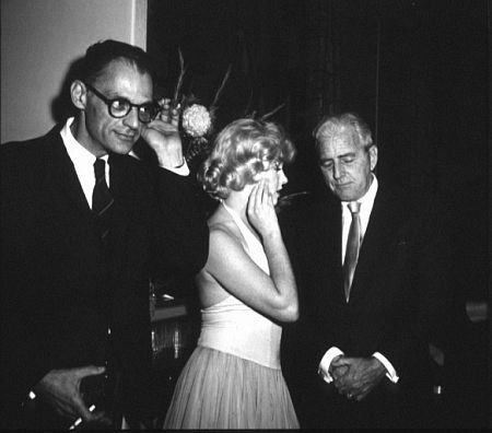 M. Monroe & Arthur Miller at party for 