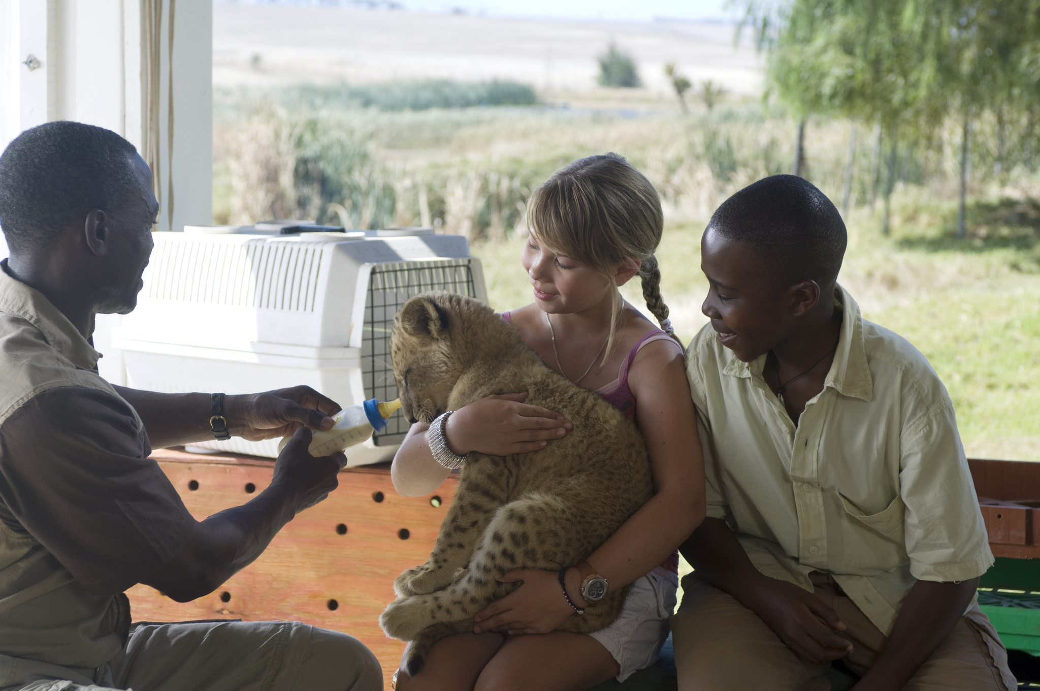 Still of Uncle Rudy, Bindi Irwin, Getmore Sithole and Siyabulela Ramba in Free Willy: Escape from Pirate's Cove (2010)