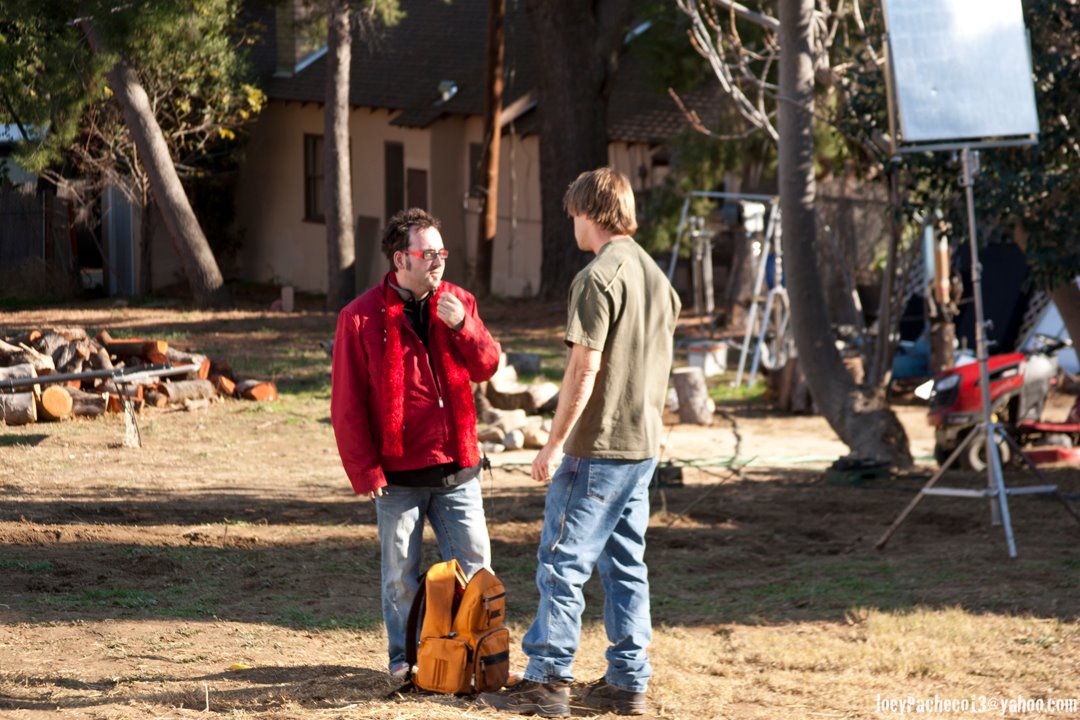 Director Paul Morrell on the set of HUFF with Charlie O'Connell