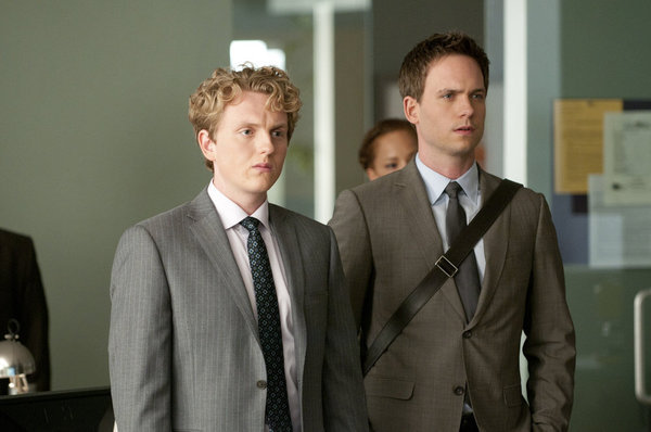 Still of Patrick J. Adams and Max Topplin in Suits (2011)
