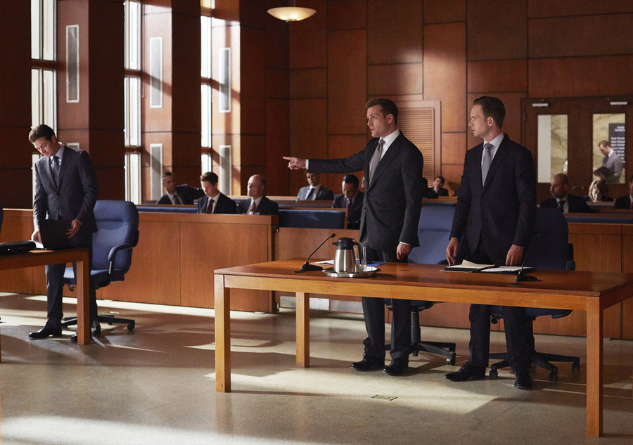 Still of Gabriel Macht and Patrick J. Adams in Suits (2011)