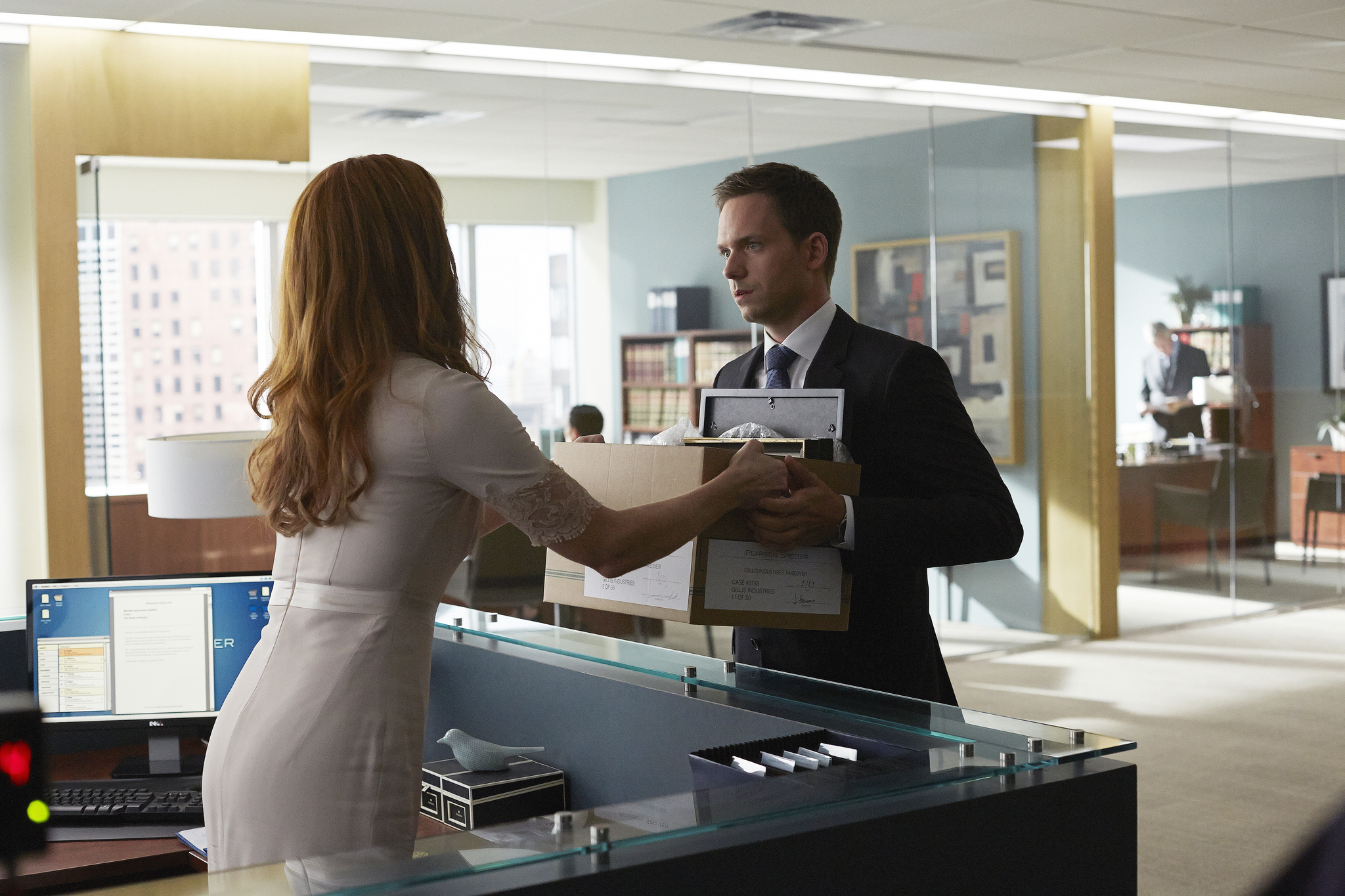 Still of Patrick J. Adams and Sarah Rafferty in Suits (2011)