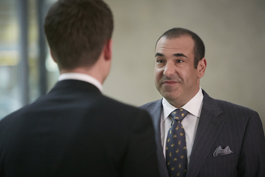 Still of Rick Hoffman and Patrick J. Adams in Suits (2011)