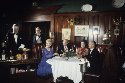 Maude Chasen at Chasen's Restaurant (photographer Wallace Seawell seated at the far right)
