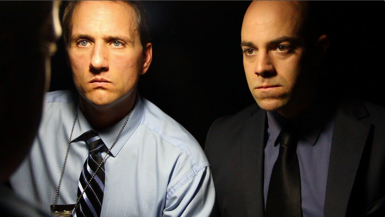 Jim Klock and Mike Capozzi as Detectives Colt Python and Jack Steel