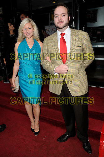 Jonathan Sothcott and Abi Titmuss on the red carpet at the gala screening of Devil's Playground in London